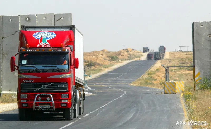 A truck loaded with goods for the Gaza Strip enters the Kerem Shalom terminal , on June 22, 2011 on the border with Gaza and Israel. Photo by Abed Rahim Khatib