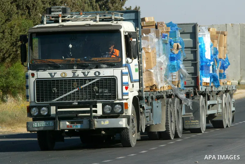 A truck loaded with goods for the Gaza Strip enters the Kerem Shalom terminal , on June 22, 2011 on the border with Gaza and Israel. Photo by Abed Rahim Khatib