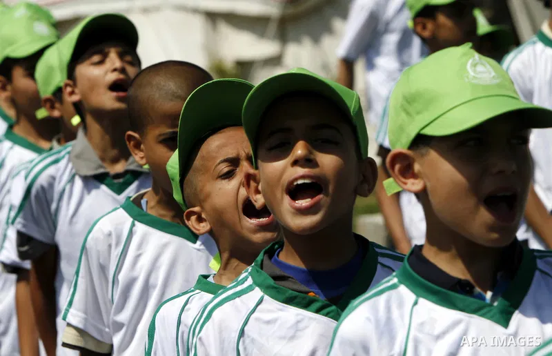 Palestinian boys attend a summer camp organised by the Islamist movement Hamas in Gaza City on June 23, 2011. Photo by Ashraf Amra