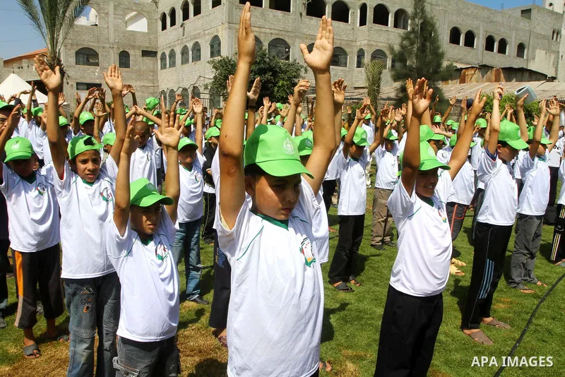 Palestinian boys attend a summer camp organised by the Islamist movement Hamas in Gaza City on June 23, 2011. Photo by Ashraf Amra