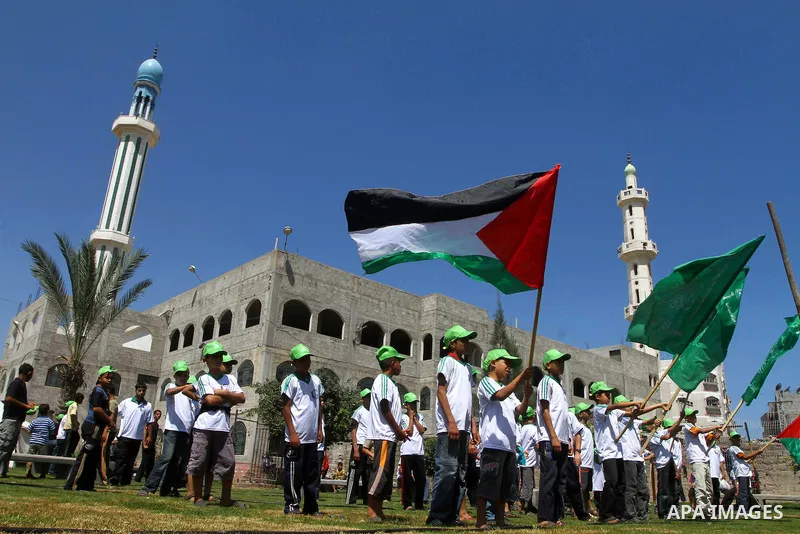 Palestinian boys attend a summer camp organised by the Islamist movement Hamas in Gaza City on June 23, 2011. Photo by Ashraf Amra