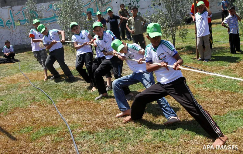 Palestinian boys attend a summer camp organised by the Islamist movement Hamas in Gaza City on June 23, 2011. Photo by Ashraf Amra