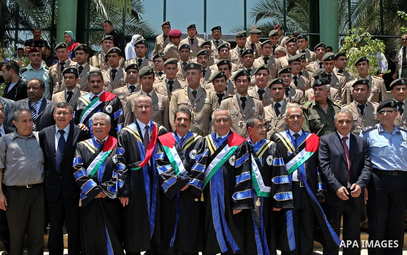 Palestinian Prime Minister, Salam Fayyad attends the graduation ceremony of the students of security, intelligence and the Hebrew language Diploma in the West Bank city of Ramallah on Jun 23,2011. Photo by Mustafa Abu Da...