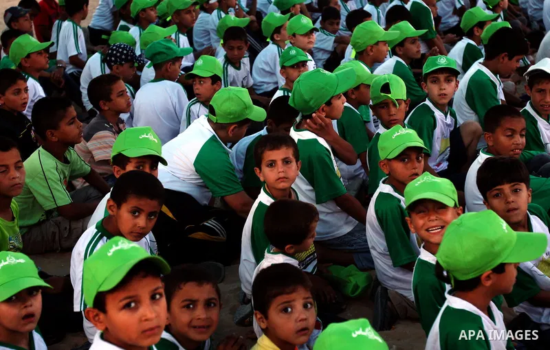 Palestinian boys play at a summer camp organised by the Islamist movement Hamas in Gaza City on June 23, 2011. Photo by Ali Jadallah