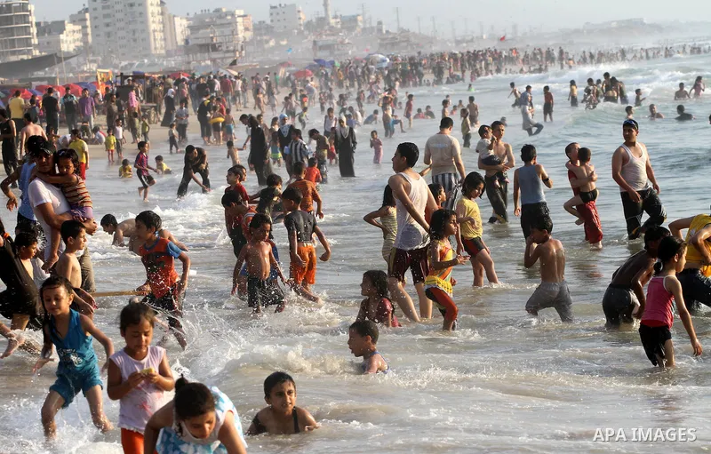 Palestinians enjoy a day at the beach in Gaza City on June 24, 2011. Photo by Mohammed Asad