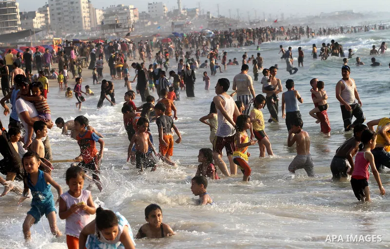 Palestinians enjoy a day at the beach in Gaza City on June 24, 2011. Photo by Mohammed Asad