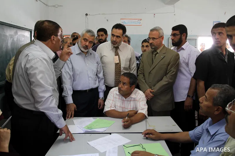 Palestinian Prime Minister in Gaza Strip, Ismail Haniya inspects teachers during correcting the papers of the high school exams known as "Tawjihi" , in Gaza City on June 25, 2011. Photo by Mohammed Asad
