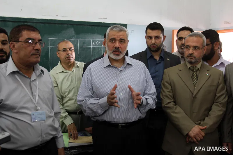 Palestinian Prime Minister in Gaza Strip, Ismail Haniya inspects teachers during correcting the papers of the high school exams known as "Tawjihi" , in Gaza City on June 25, 2011. Photo by Mohammed Asad