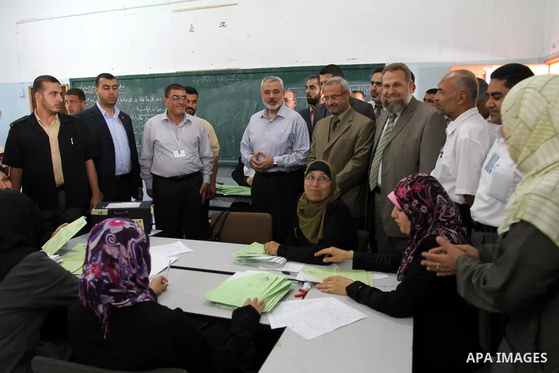 Palestinian Prime Minister in Gaza Strip, Ismail Haniya inspects teachers during correcting the papers of the high school exams known as "Tawjihi" , in Gaza City on June 25, 2011. Photo by Mohammed Asad