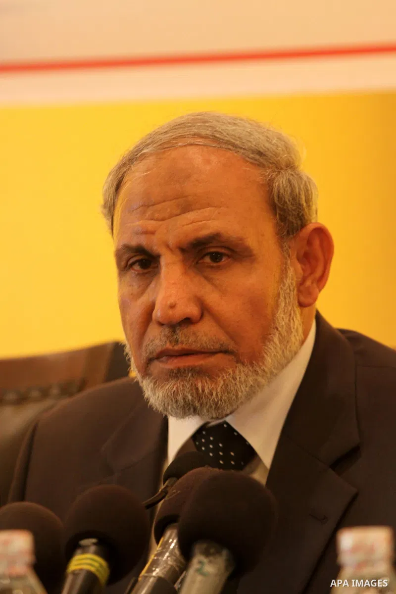 Palestinian senior Hamas leader, Mahmoud al-Zahar delivers speech during a meeting to announce for his new book in Gaza city on Jun 25,2011. Photo by Mohammed Asad