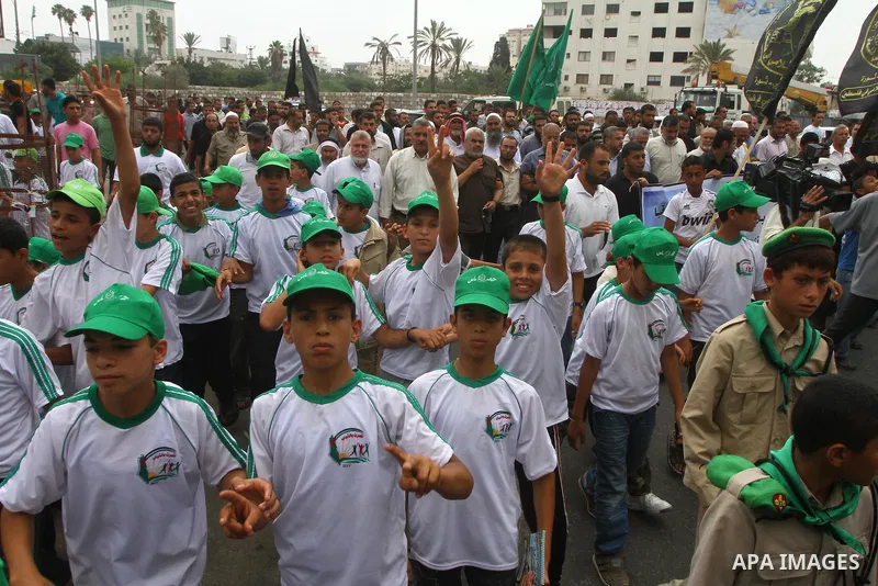 Palestinian boys shout slogans during a protest in Gaza City calling for the release of Palestinian prisoners held in Israeli jails, on June 27, 2011. Photo by Ashraf Amra