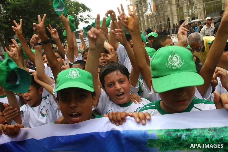 Palestinian boys shout slogans during a protest in Gaza City calling for the release of Palestinian prisoners held in Israeli jails, on June 27, 2011. Photo by Ashraf Amra