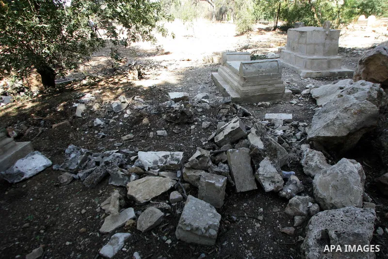 Palestinians and Israeli Arab kenaset members take a part in a protest to the Israeli violations of the Islamic sanctities in Jerusalem on June 27, 2011. where washed away and destroyed yesterday about 100 grave in "Maam...