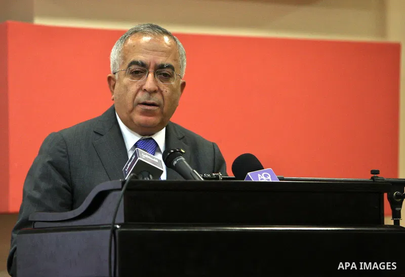 Palestinian Prime Minister, Salam Fayyad reports a speech during the First Islamic Jerusalem conference in the West Bank city of Ramallah on June 27, 2011. Photo by Mustafa Abu Dayeh