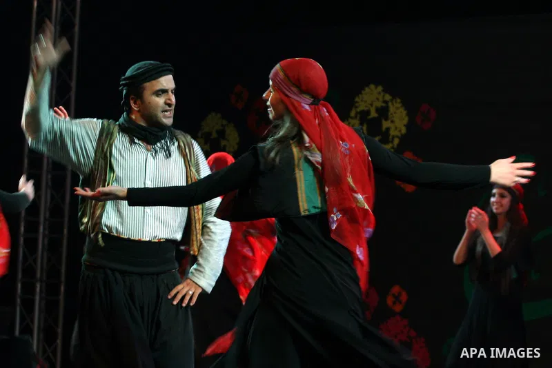 Palestinian dancers from the Wishah Popular Dance Troupe perform the festival "nights of Birzeit" at Birzeit University in the West Bank city of Ramallah on June 28, 2011. Photo by Issam Rimawi
