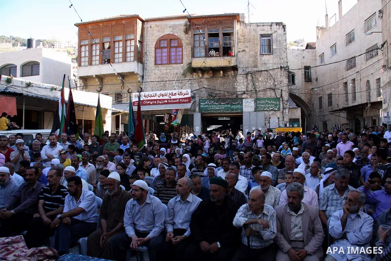 Palestinians celebrate on the occasion of the anniversary of Isra and Al Maraj in the Nablus old city in the West Bank , Wednesday, June 29, 2011. Photo by Wagdi Eshtayah
