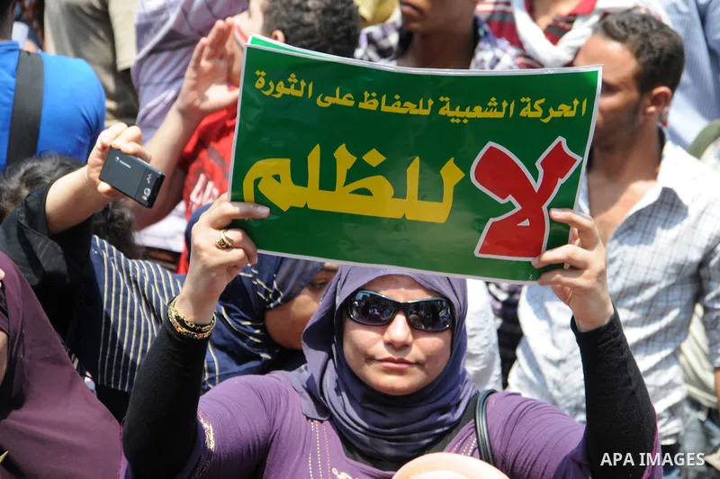 Egyptians take part in a rally after prayer at Tahrir Square in Cairo, Egypt, on July 1, 2011. Hundreds of people were rallying in the square, that was the epicenter of the uprising that toppled Hosni Mubarak, demanding...