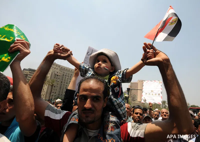 Egyptians take part in a rally after prayer at Tahrir Square in Cairo, Egypt, on July 1, 2011. Hundreds of people were rallying in the square, that was the epicenter of the uprising that toppled Hosni Mubarak, demanding...