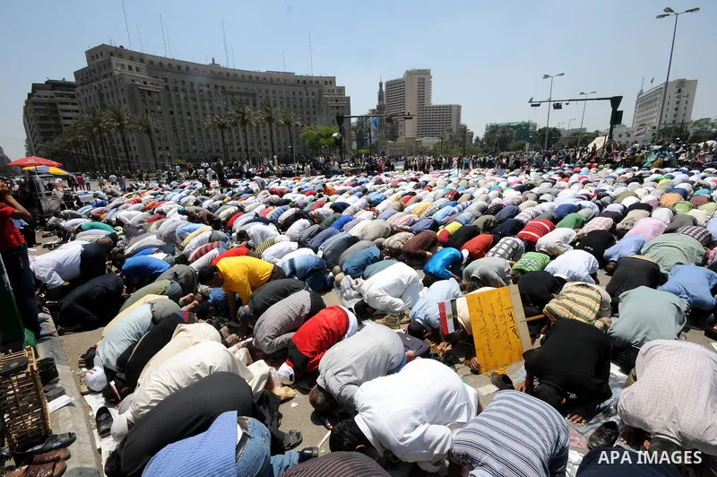Egyptians attend Friday prayers at Tahrir Square in Cairo, Egypt, on July 1, 2011. Hundreds of people were rallying in the square, that was the epicenter of the uprising that toppled Hosni Mubarak, demanding speedy trial...