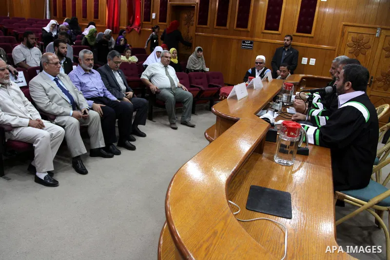 Palestinian Prime Minister in Gaza strip, Ismail Haniya attends the discussion of the Master of blind students at the Islamic University in Gaza city on July 2, 2011. Photo by Mohammed Asad