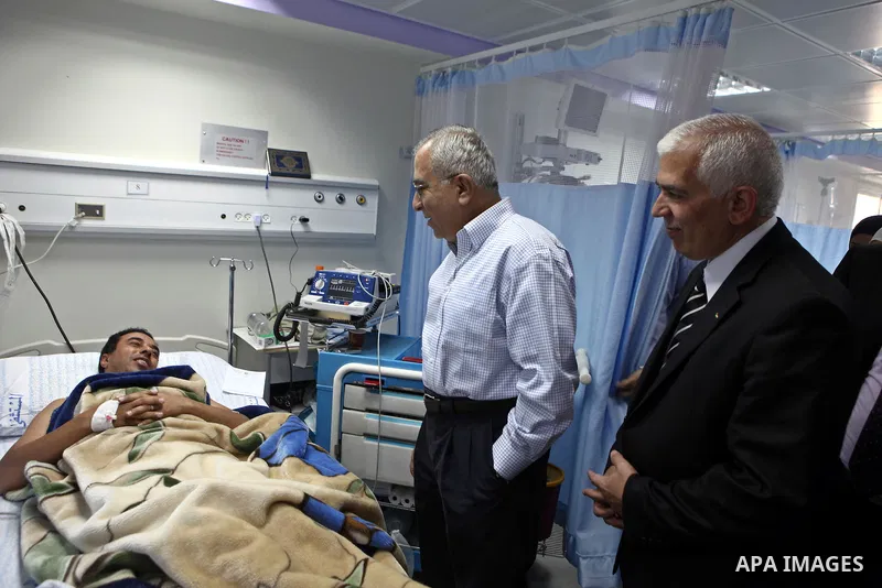 Palestinian Prime Minister, Salam Fayyad during an inspection tour in the Al-Ahli Hospital in the West Bank city in Hebron on July 2, 2011. Photo by Mustafa Abu Dayyeh