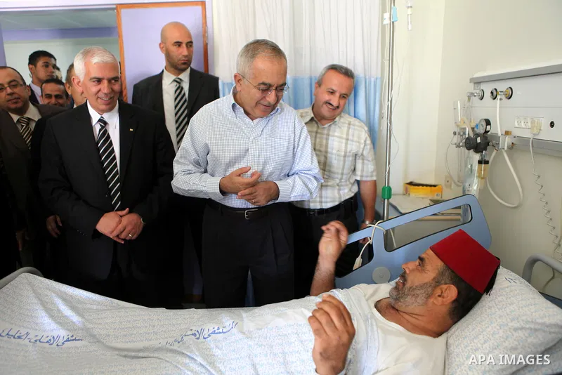 Palestinian Prime Minister, Salam Fayyad during an inspection tour in the Al-Ahli Hospital in the West Bank city in Hebron on July 2, 2011. Photo by Mustafa Abu Dayyeh