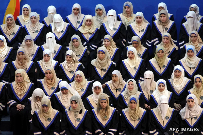 Palestinian students participate in their graduation ceremony at the Islamic University in Gaza city on July 4,2011. Photo by Mohammed Asad