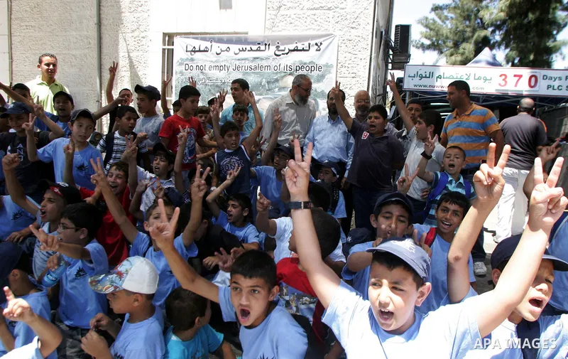 Palestinian children participating in summer camps visit Hamas legislators at the International Red Cross offices in Jerusalem's old city on july 5, 2011. Hamas legislators have been living inside the ICRC compound in Je...