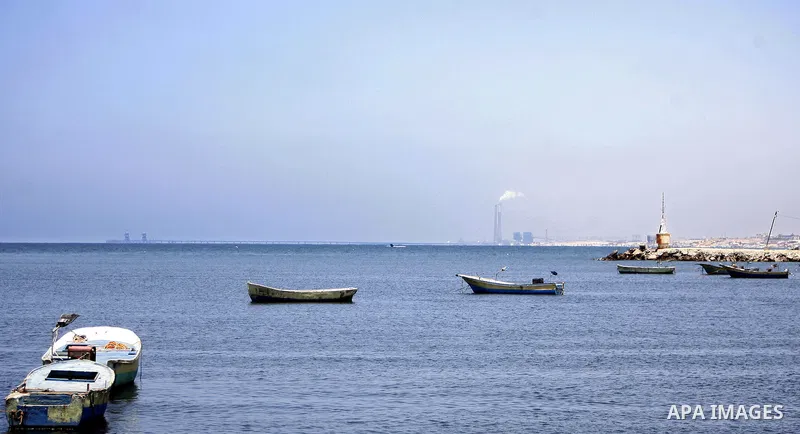 Empty boats are seen in the port of Gaza City, Tuesday, July 5, 2011, as pro-Palestinian activists from an international flotilla banned from setting sail for Gaza by Greek authorities occupied the Spanish Embassy in Ath...