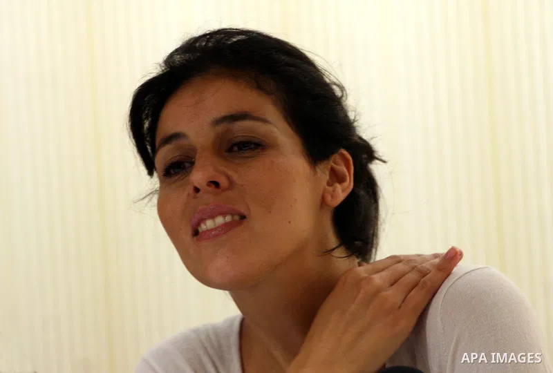 Souad Massi, Algerian singer and songwriter living in France, speaks during a press conference ahead of her concert during the Palestine International Festival 2011, in the West Bank city of Ramallah, Tuesday, July 5, 20...
