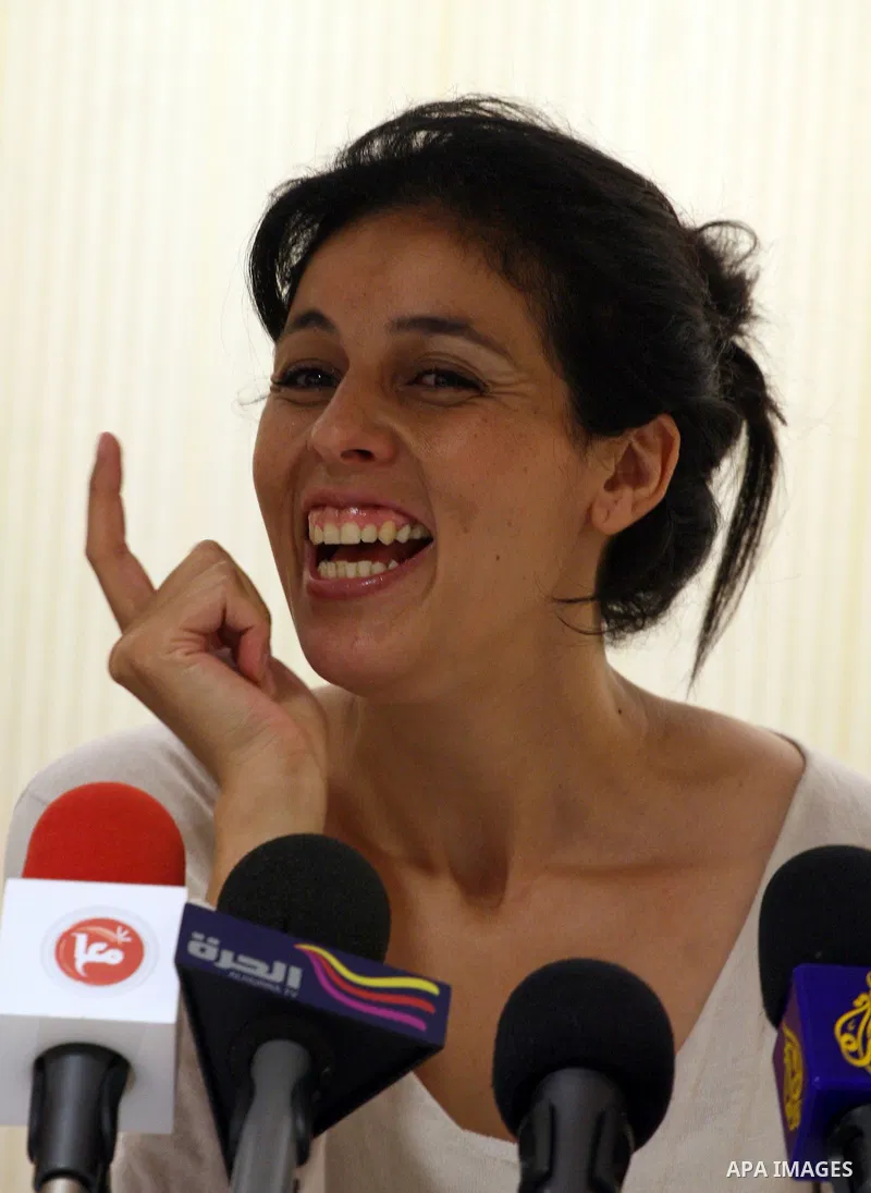 Souad Massi, Algerian singer and songwriter living in France, speaks during a press conference ahead of her concert during the Palestine International Festival 2011, in the West Bank city of Ramallah, Tuesday, July 5, 20...