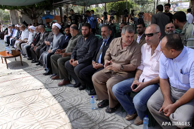 Palestinian Legislative Council members take part in a protest in Gaza City on July 6, 2011. In support with Hamas legislators have been living inside the ICRC compound in Jerusalem for the past one year fearing expulsio...