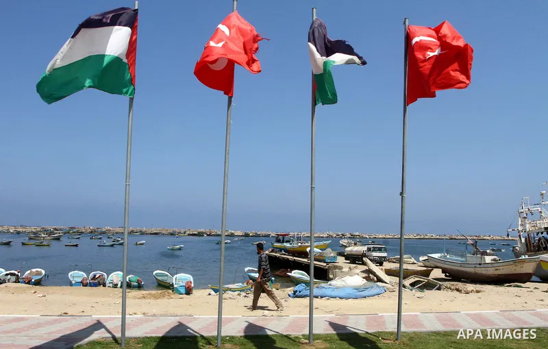 Palestinians take part in a rally to show solidarity with the "Freedom Flotilla II" at Gaza seaport July 6, 2011. Pro-Palestinian activists hoping to sail to Gaza this week fully expected their flotilla to be blocked by...