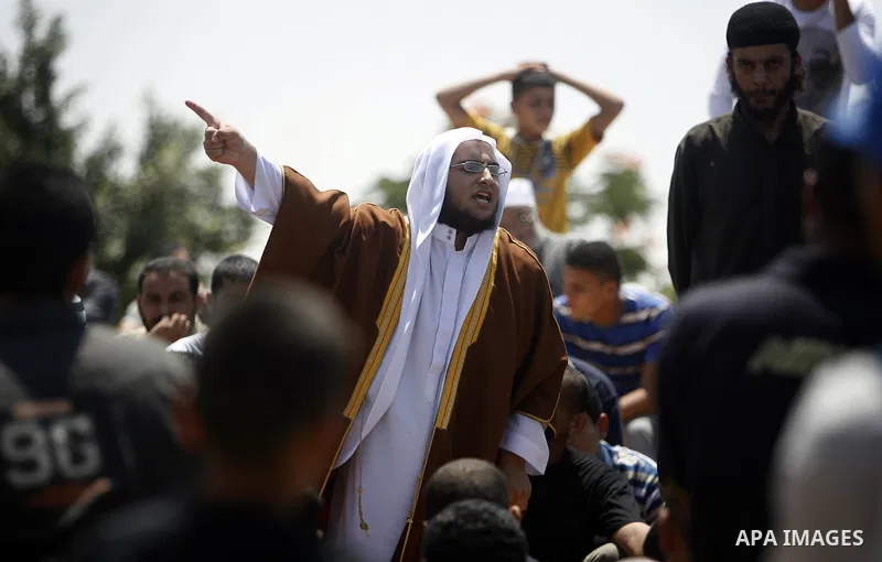Palestinian relatives mourn the body of Kamal Hamdan Muammar, 28-years-old, for burial following prayers at the mosque in the Rafah refugee camp, in the southern of Gaza Strip, on July 6, 2011, after being killed along w...