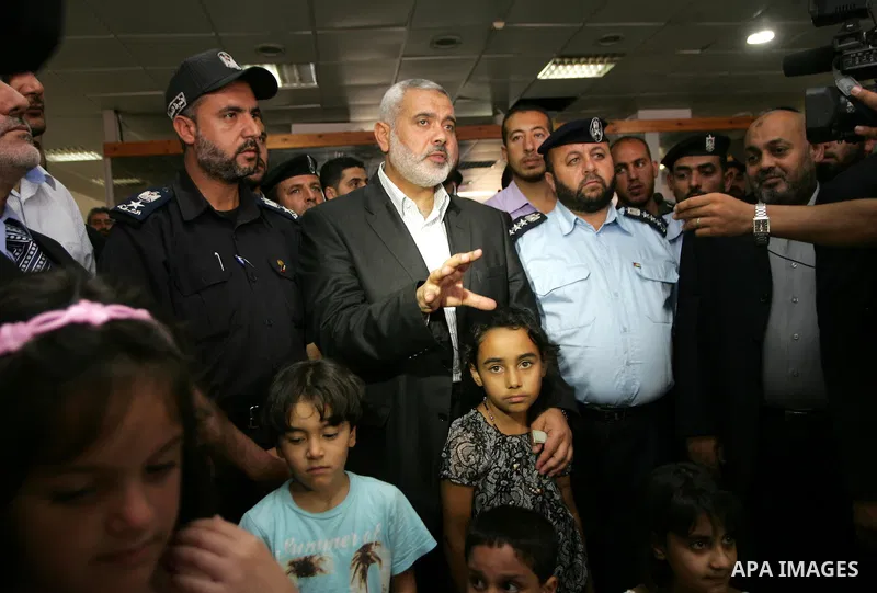 Palestinian Prime Minister in Gaza Strip, Ismail Haniya visits the travellers leaving the Gaza Strip through the Rafah crossing into Egypt during his visit to the Rafah border crossing in the southern Gaza Strip on July...