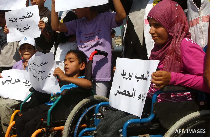 Physically disabled Palestinian take part in a rally to show solidarity with the "Freedom Flotilla II" at Gaza seaport o July 7, 2011. Pro-Palestinian activists hoping to sail to Gaza this week fully expected their floti...