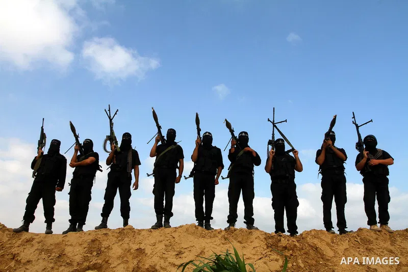 Palestinian militants from Al-Ansar brigades, the armed wing of Al-Ahrar movement, demonstrate their skills during a drill in front of the media in Khan Younis in the southern Gaza Strip July 7, 2011. Photo by Ashraf Amr...