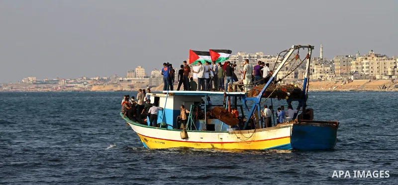 Palestinians take Part during a protest in the port at Gaza City on July 7, 2011. Pro-Palestinian activists hoping to sail to Gaza this week fully expected their flotilla to be blocked by Israeli marines. Photo by Ashraf...