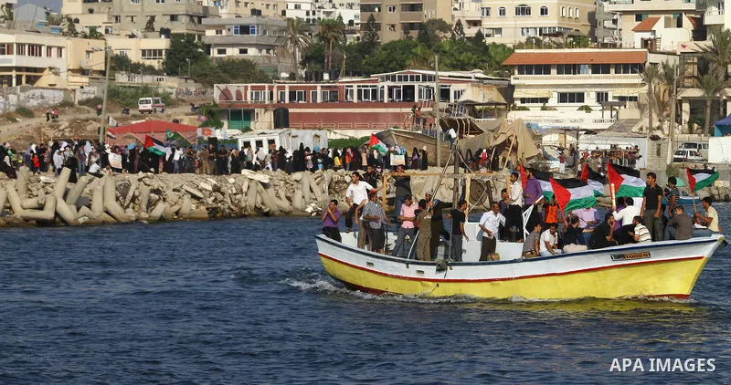 Palestinians take Part during a protest in the port at Gaza City on July 7, 2011. Pro-Palestinian activists hoping to sail to Gaza this week fully expected their flotilla to be blocked by Israeli marines. Photo by Ashraf...