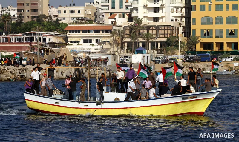 Palestinians take Part during a protest in the port at Gaza City on July 7, 2011. Pro-Palestinian activists hoping to sail to Gaza this week fully expected their flotilla to be blocked by Israeli marines. Photo by Ashraf...