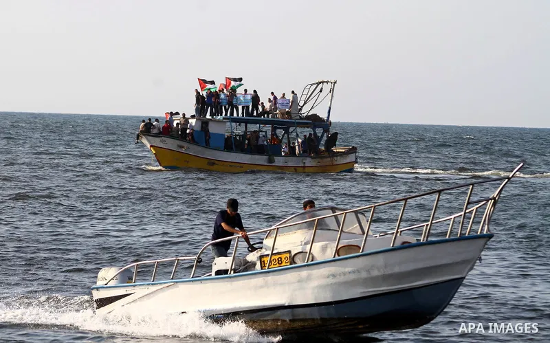 Palestinians take Part during a protest in the port at Gaza City on July 7, 2011. Pro-Palestinian activists hoping to sail to Gaza this week fully expected their flotilla to be blocked by Israeli marines. Photo by Ashraf...