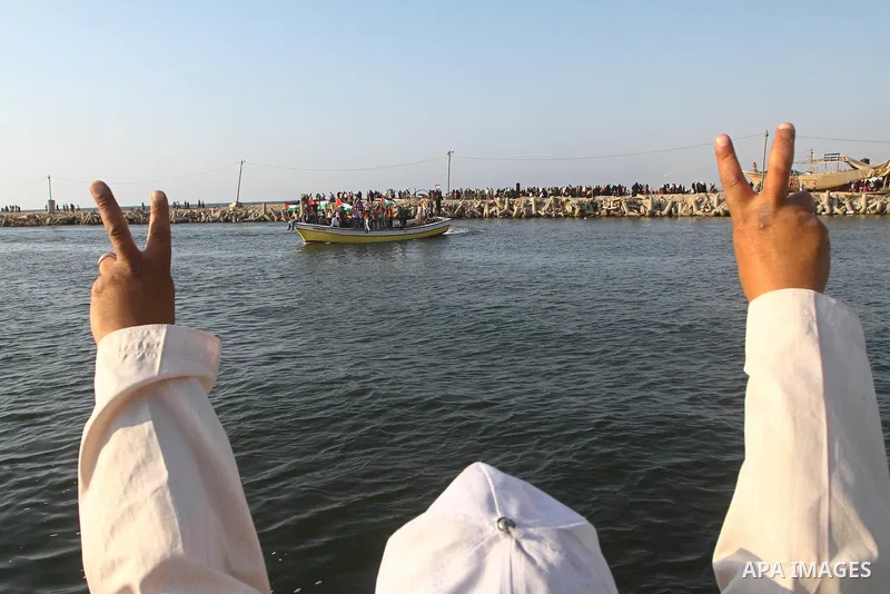 Palestinians take Part during a protest in the port at Gaza City on July 7, 2011. Pro-Palestinian activists hoping to sail to Gaza this week fully expected their flotilla to be blocked by Israeli marines. Photo by Ashraf...