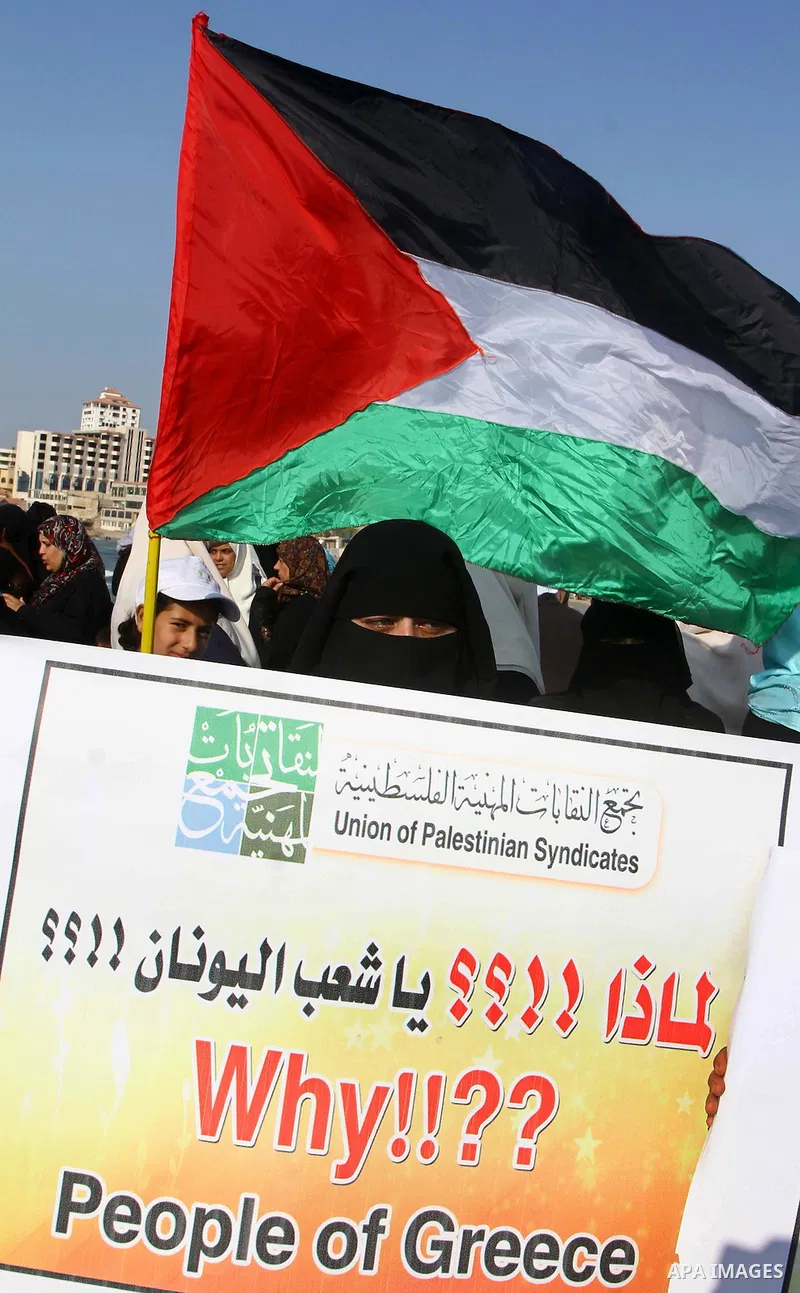 Palestinians take Part during a protest in the port at Gaza City on July 7, 2011. Pro-Palestinian activists hoping to sail to Gaza this week fully expected their flotilla to be blocked by Israeli marines. Photo by Ashraf...