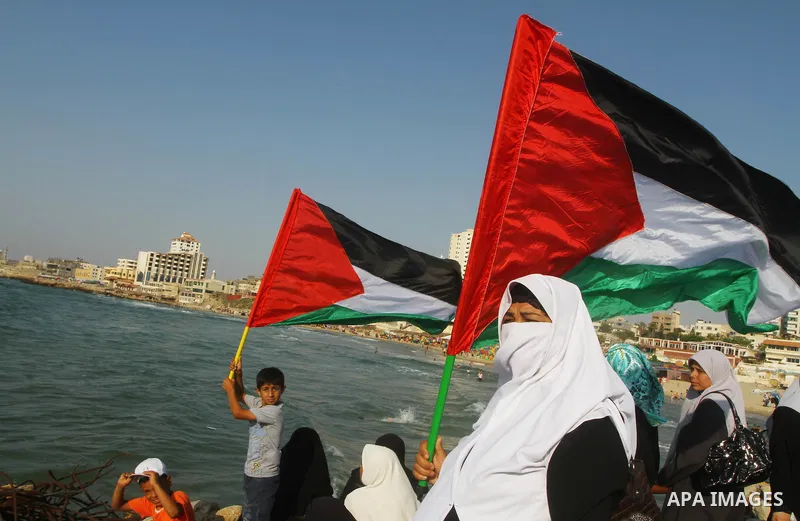 Palestinians take Part during a protest in the port at Gaza City on July 7, 2011. Pro-Palestinian activists hoping to sail to Gaza this week fully expected their flotilla to be blocked by Israeli marines. Photo by Ashraf...