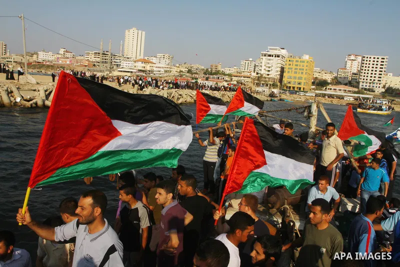 Palestinians take Part during a protest in the port at Gaza City on July 7, 2011. Pro-Palestinian activists hoping to sail to Gaza this week fully expected their flotilla to be blocked by Israeli marines. Photo by Ashraf...