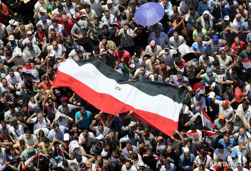 Protesters gather in Tahrir square in Cairo July 8, 2011. Thousands of Egyptians gathered in Cairo's Tahrir Square on Friday to demand faster reforms and the swifter prosecution of former officials from Hosni Mubarak's t...