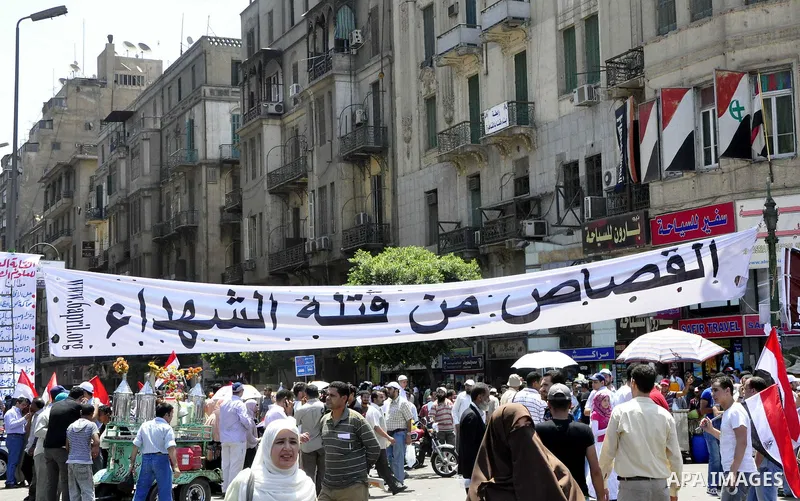 Protesters gather in Tahrir square in Cairo July 8, 2011. Thousands of Egyptians gathered in Cairo's Tahrir Square on Friday to demand faster reforms and the swifter prosecution of former officials from Hosni Mubarak's t...