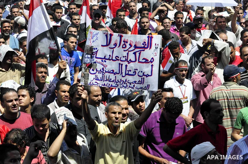 Protesters gather in Tahrir square in Cairo July 8, 2011. Thousands of Egyptians gathered in Cairo's Tahrir Square on Friday to demand faster reforms and the swifter prosecution of former officials from Hosni Mubarak's t...