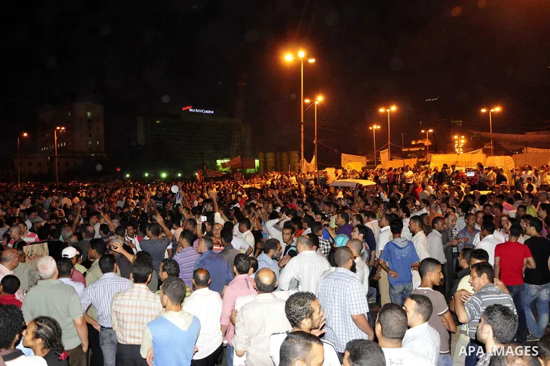 Protesters gather in Tahrir Square in Cairo in the evening hours of July 8, 2011. Tens of thousands of Egyptians packed city centres across the country on Friday, demanding faster reforms and voicing frustration at what...