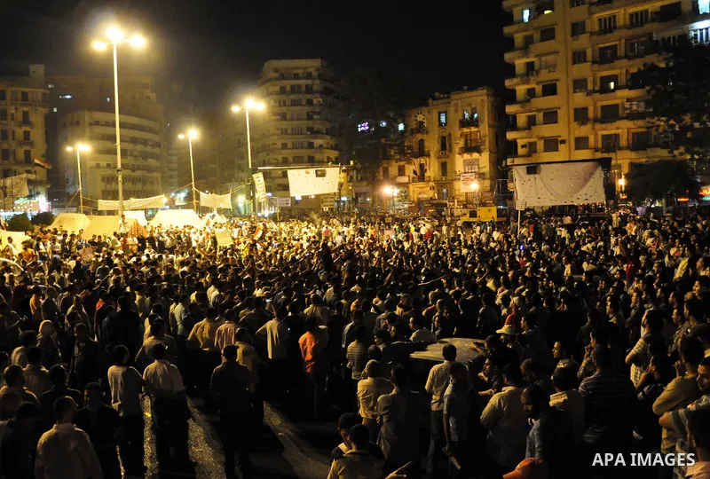 Protesters gather in Tahrir Square in Cairo in the evening hours of July 8, 2011. Tens of thousands of Egyptians packed city centres across the country on Friday, demanding faster reforms and voicing frustration at what...